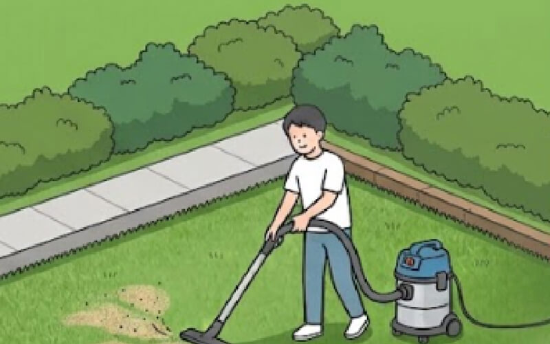 人工芝のゴミを吸い取る